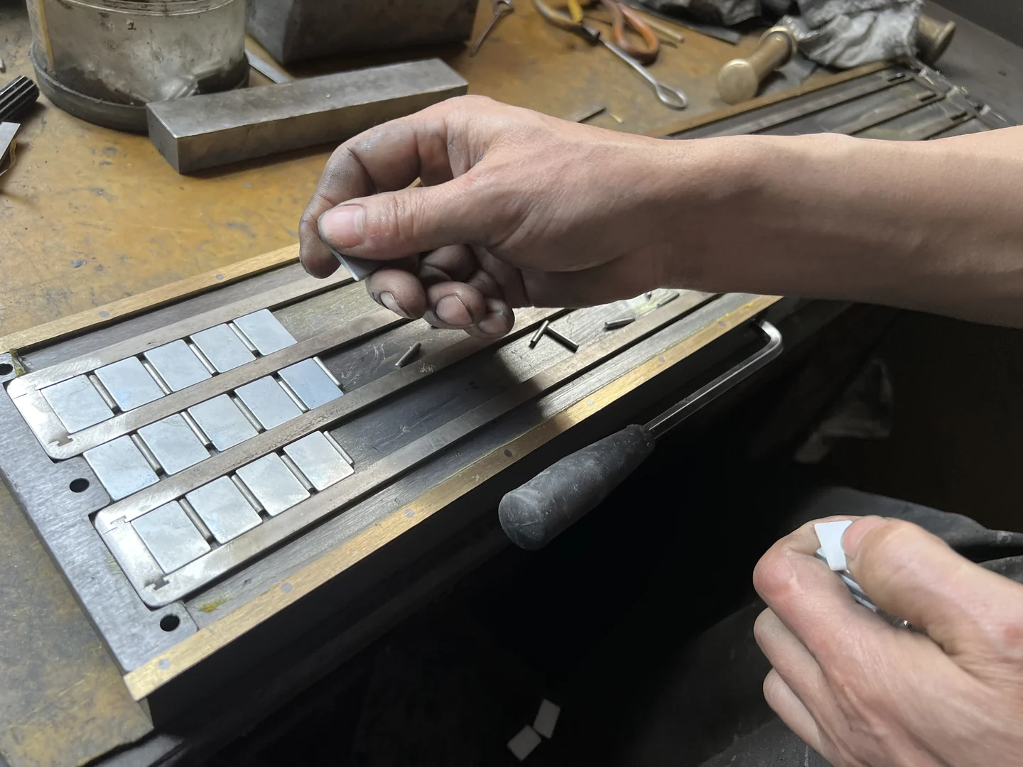 Hand fitting pole components during magnetic chuck assembly