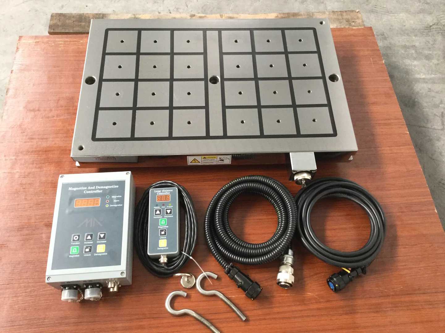 Electro permanent magnetic chuck with controller, pendant and connecting cables