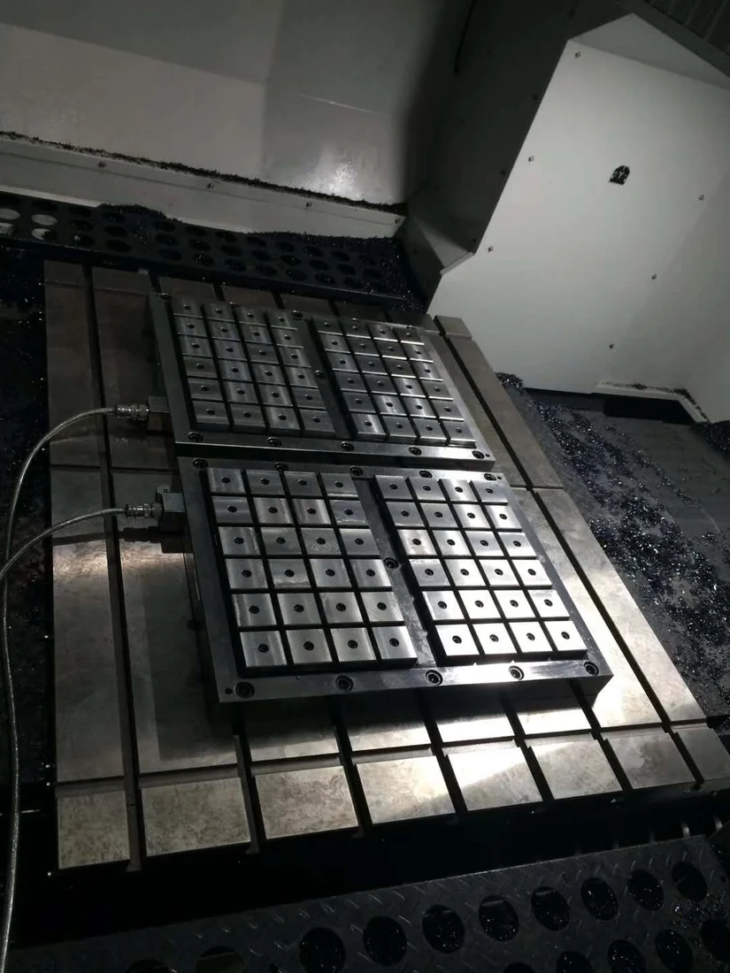 Magnetic chuck installed on a CNC machine table